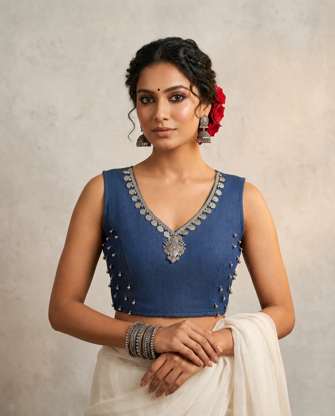 Captivating Denim Embroidery Blouse with a Durga Face Locket